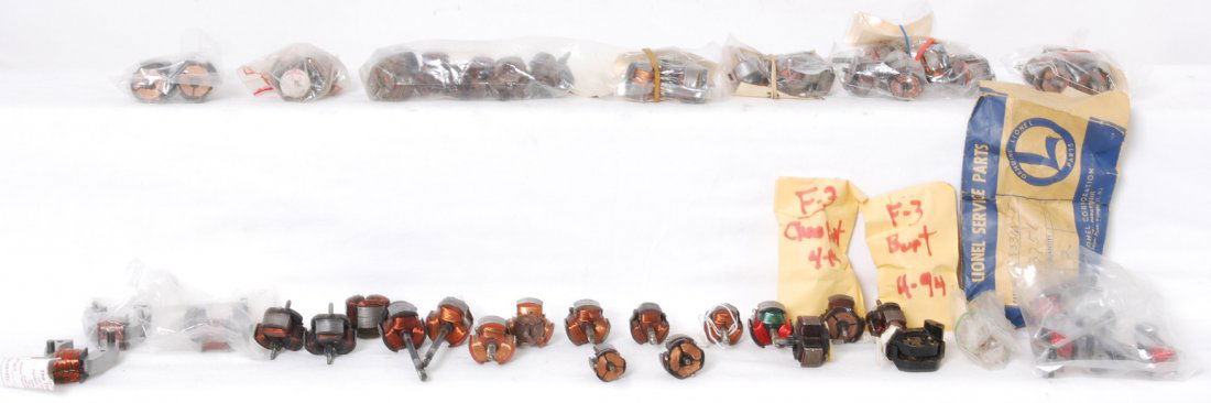 Large lot of Lionel motor armatures and fields, NOS: Postwar Lionel O gauge motor armatures and fields, some are NOS, most are very clean used, some may be just parts. Sold as is shown in our photos with no returns. One of many parts lots. Many are iden