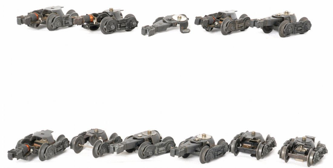 Lionel 027 passenger car & bay window caboose trucks: Postwar Lionel O gauge truck assemblies, identified as 027 passenger cars and bay window cabooses. Sold as is shown in our photos with no returns. One of many parts lots.