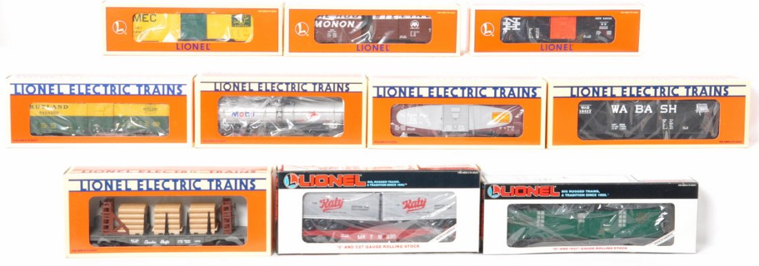 10 Lionel freight cars 16330, 16701, 19277, 19279, etc: Lionel modern O gauge freight cars in OB. Ten freight cars include 16330 MKT flat with trailer, 16701 Southern tool car, 16127 Mobil tank car, 19295 New Haven boxcar, 29203 Maine Central boxcar, 19279