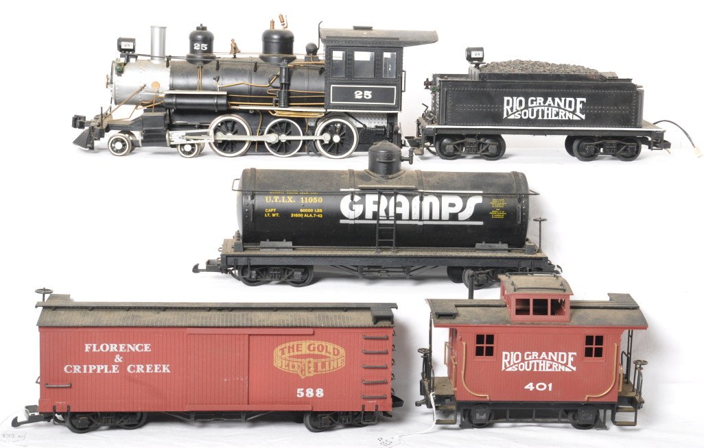 Bachmann G scale train set Rio Grande Southern: Bachamnn modern G scale trains. Includes Rio Grande Southern steam locomotive, Gramps tank car, Florence and Cripple Creek boxcar, and Rio Grande Southern caboose. Trains are dirty with some broken de