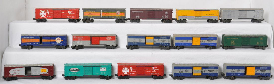 Fifteen Lionel postwar O gauge 6464- boxcars: Postwar Lionel O gauge 6446 boxcars, fifteen total. Storage dust, grime, etc. Trains should clean C6-7 area. -450, -150, -150, -650, -1, -200, -150, -75, -700, -125, -400, -150, -700, -375, -900.