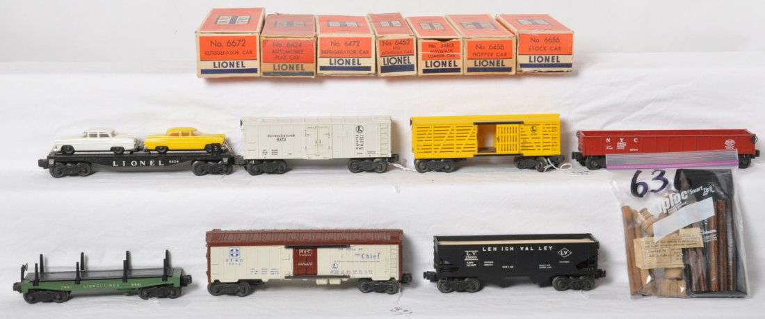 Lionel 6472, 6424, 6656, 3461X, 6456, 6672, 6462 in OB: Postwar Lionel O gauge 6472 refrigerator car, 6424 automobile flatcar, 6656 stockcar, 3461X automatic lumber car, 6456 LV hopper, 6672 blue lettered Santa Fe reefer, and 6462 New York Central red gond