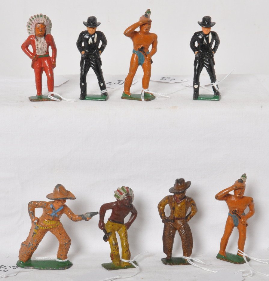 Cast iron Cowboys and Indian figures, one Barclay hollo: Vintage cast iron Cowboys and Indians figures, unmarked in original paint. Condition ranges C6 to C9 area. One hollow diecast Barclay Cowboy figure No. 753. Please view photo for best description. Eig