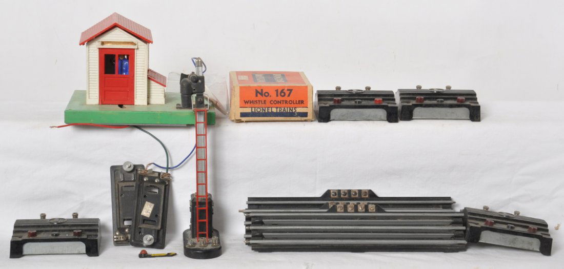 Lionel 167, 151, gateman, RCS....: Lot of postwar Lionel accessories, C4-6 area. Five 167 (one in OB), three RCS, 151 semaphore, gateman, 145C.