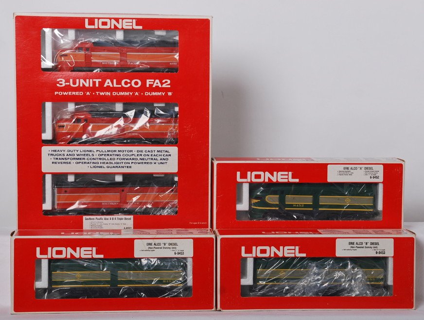 Lionel Southern Pacific and Erie Alco A-B-A sets: Lionel modern O gauge locomotives in OBs. Includes 8552 Southern Pacific Daylight Alco FA A-B-A and Erie 8452, and two 8453 Alco A-B-B set. Trains are C8 area. OBs have some light wear and marking sti