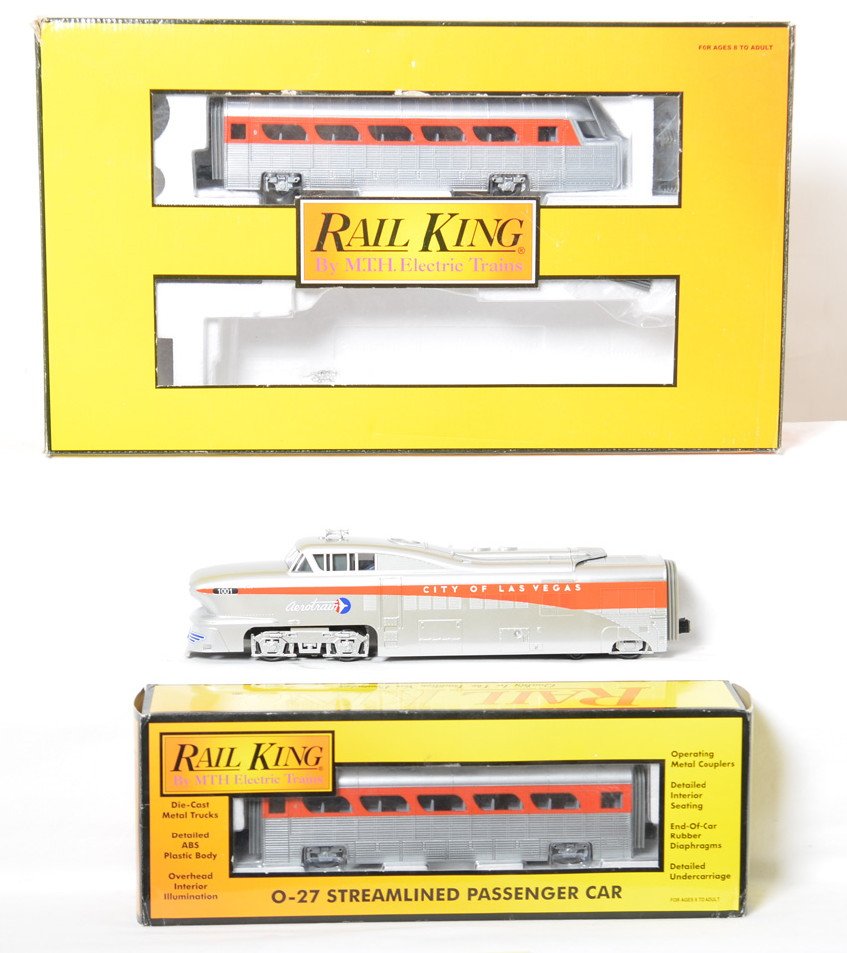 Railking Union Pacific Aero Train and add on: MTH Railking modern O Gauge Union Pacific Aero Train in OB with add on coach. Catalog number is 30-2376-0. Set features Loco Sounds Set is C8 with run time, however trains have slight odor of moth bal