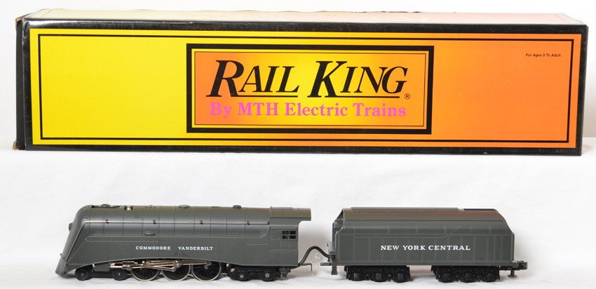 Railking New York Central Commodore Vanderbilt: MTH Railking modern O gauge 30-1133-0 New York Central Commodore Vanderbilt in OB. Loco features smoke and whistle. Loco is C8 with run time. OB has some light corner and edge wear.