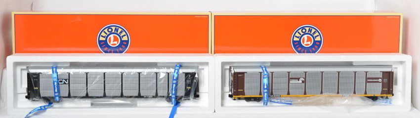2 Lionel 89Õ foot auto racks 27492, 27473: Lionel modern O gauge 89Õ foot auto racks in OBs. Includes 27492 Canadian National and 27473 Conrail. Brand new C9-10, one unwrapped for photos.