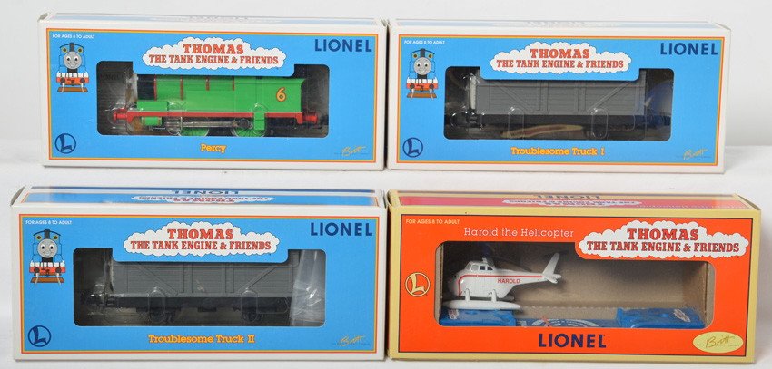 Lionel Percy, Troublesome Trucks, and Harold: Lionel modern O gauge Thomas and Friends items. Includes 18722 Percy steam locomotive, 36030 and 36031 Troublesome Trucks, and 16173 Harold The Helicopter flat. C8 with run time.