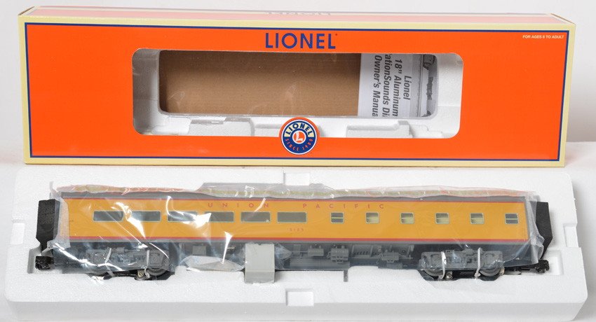 Lionel 25441 Union Pacific Station Sounds diner: Lionel modern O gauge 25441 Union Pacific aluminum 18 inch Station Sounds diner in OB. Diner is C9 with very faint if any run time. Does not appear to have been unwrapped.