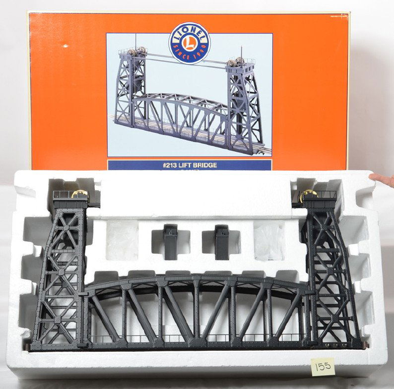 Lionel 14167 Lift Bridge: Lionel modern O gauge 14167 #213 lift bridge in OB. The bridge has been opened and shows light use. C8. OB has some corner and edge wear.