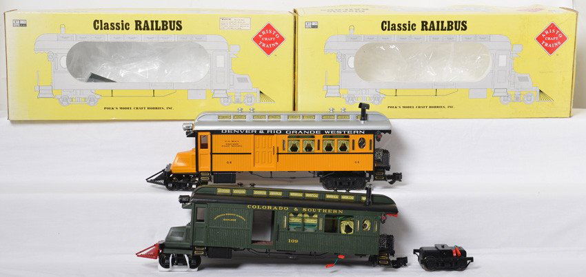 2 Aristo Craft Rail buses 83101 83102: Aristo Craft modern G scale Rail buses in OBs. Two busses include 83101 Rio Grande in C7-8 condition and 83102 Colorado Southern bus in C6 condition with detached power truck and detail parts. OBs hav
