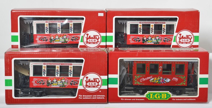 4 LGB 35078 36078 Christmas coaches: LGB modern G scale Christmas coaches in OBs. Four cars include three 35078 2007 coaches, and 36078 1998 coach. C9-10. OBs have marking stickers and light shelf wear.