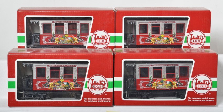 4 LGB 35079 Christmas coaches: LGB modern G scale Christmas coaches in OBs. Four cars include 35079 2008 coaches C9-10. OBs have marking stickers and light shelf wear.