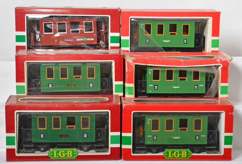 6 LGB passenger cars 3010, 3014, 31073, etc: LGB modern G scale passenger cars in OBs. Six cars include 3014 3/3 coach, 0314 2/2 coach, 3014 2/2 coach, 3010 III/III coach, 3010 III/III coach, and 31073 ZB 2nd class coach. Cars range C6+ to C8. B