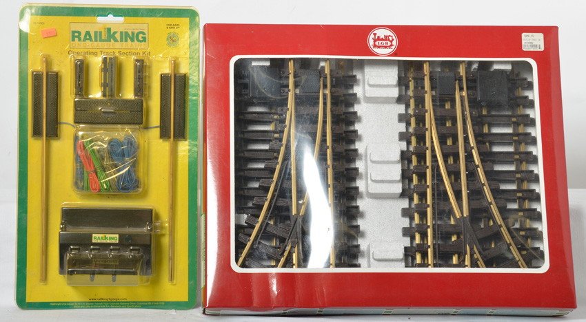 LGB 19902 track expansion and Railking activation track: LGB and Railking modern G scale items. Includes LGB 19902 track expansion pack, and 70-14008 Railking operating track section kit. C8-9.