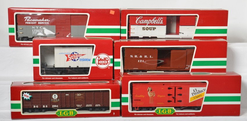 6 LGB freight cars 43030, 41911, 48670, 43740, etc: LGB modern G scale freight cars in OBs. Six cars include 47914 New York Central boxcar, 41911 CampbellÕs boxcar, 43030 white container car, 43740 El Producto boxcar, 48670 Sandy River boxcar, and 407