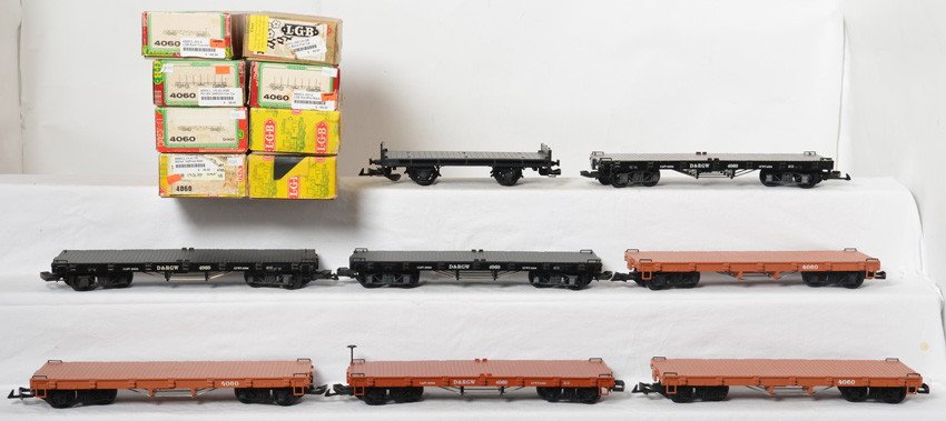 8 LGB flat cars 4060 early black, crackle, brown, etc: LGB modern G scale flat cars in OBs. Eight cars include four brown 4060 Rio Grande, two painted black Rio Grande 4060, 4060CL Rio Grande with crackle finish paint, and 4000CL black flat. OBs have pric
