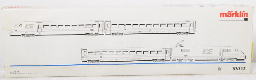 Marklin HO ICE train 33712: Marklin modern HO scale 33712 ICE four car set in OB. C8-9 area with very light wheel marks. OB has some light shelf wear and small spots of skinning.