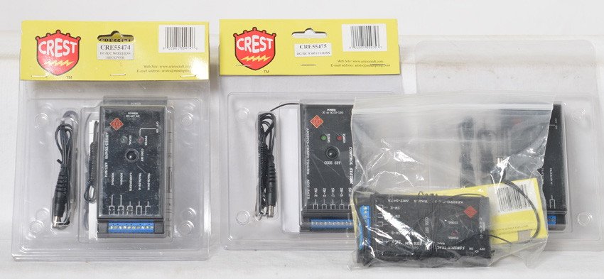 5 Crest 55474 DC wireless receiver: Crest modern G scale electronics. Includes five 55474 DC RC wireless receivers in OBs. Four are C10 the other appears C8.