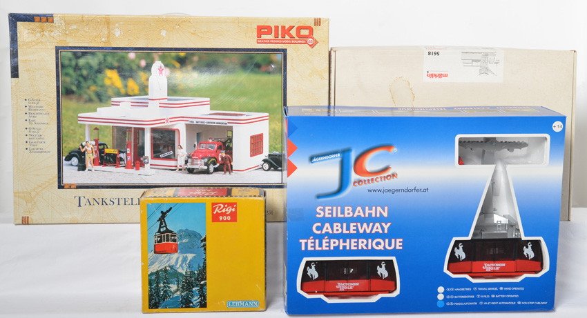2 Rigi sets, Piko Texaco kit, and Marklin sand kit: Modern G scale items including JC, Rigi, Piko, and Marklin. Items include JC Jackson Hole cable car set missing string, early 900CL Rigi 900 manual cable car, 62251 Piko Texaco station set missing a f