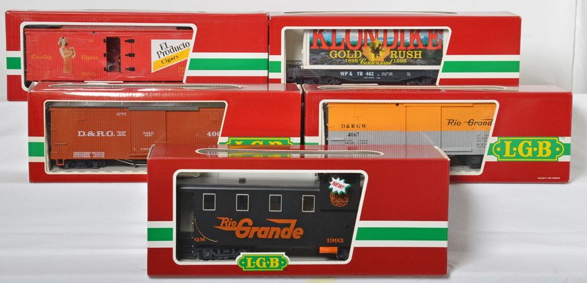 5 LGB freight cars 43740, 42710, 43850, etc: LGB modern G scale freight cars in OBs. Five cars include 43740 El Producto cigar reefer, 4067 Rio Grande boxcar, 43850 Klondike container car, 42710 Rio Grande caboose, and 4067 Rio Grande boxcar. Ca