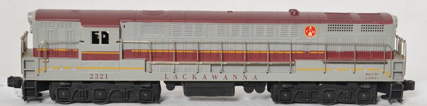 Lionel 2321 Lackawanna FM Trainmaster diesel: Postwar Lionel O gauge 2321 Lackawanna Fairbanks Morse Trainmaster diesel loco with maroon roof, typical hairlines, surface rust on some walkboards, missing horns, otherwise C7. Clean battery compartm