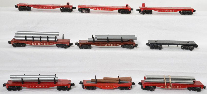 34 Lionel flat cars 2411, 6411, 6511, 6828, etc: Lionel Postwar O gauge flat cars. Includes 6411, 6511, 6411, 3451, 3650, 6520, 9121, 6311, 6467, 2411, 2411, 2411, 6511, 6511, 3451, 2411, 2411, 3361-55, six flats just marked Lionel,l6825, 6660, 6812