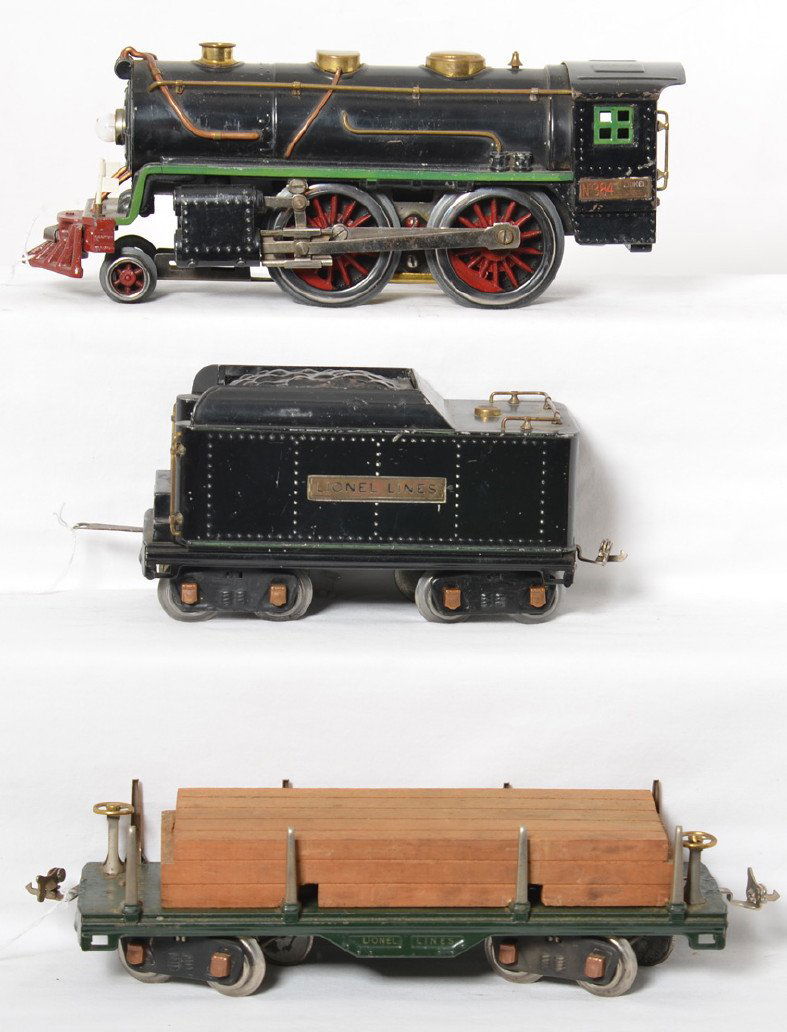 Lionel 384-E steam loco, 384-T tender, 511 flat w/lumbe: Prewar Lionel standard gauge 384-E steam locomotive and 384-T tender with copper journals, with a 511 flatcar in green with copper journals and original lumber load, C6. Loco has at least; missing fro