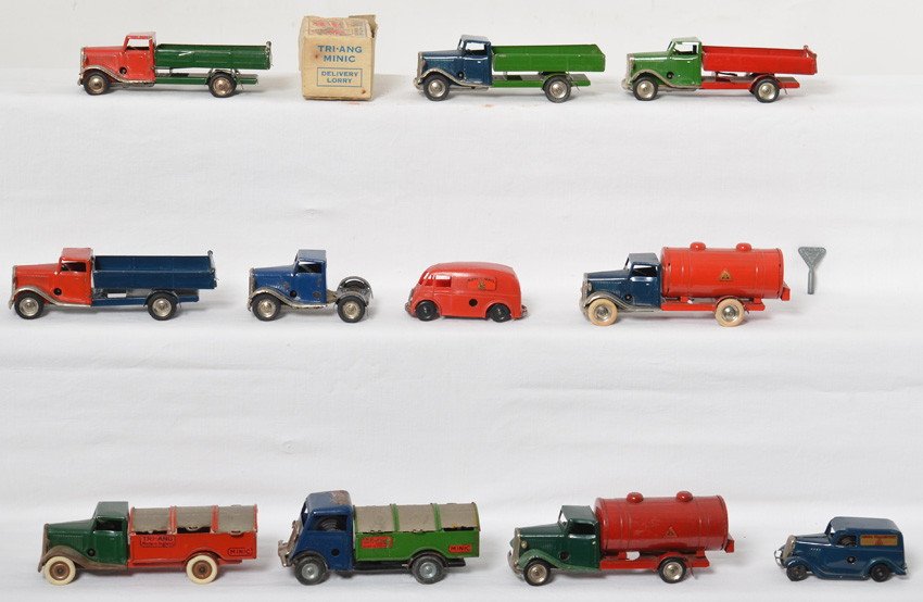 Eleven Tri-Ang Minic trucks/vehicles, one original box: Eleven Tri-Ang Minic vehicles/trucks. Some have light surface rust on undersides, C6 to C7. Delivery Lorry original box missing flaps on one end included.