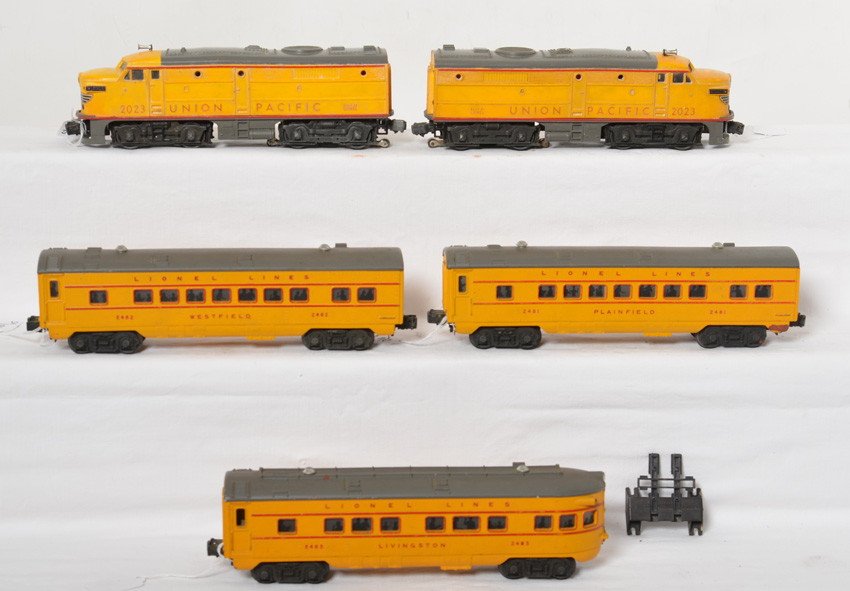 Lionel Union Pacific Alco passenger train in gray and y: Postwar Lionel O gauge Union Pacific Alco powered diesel passenger train in yellow and gray. 2023 Alco twin diesel A units with 2481 Plainfield Pullman, 2482 Westfield Pullman, and 2483 Livingston obs