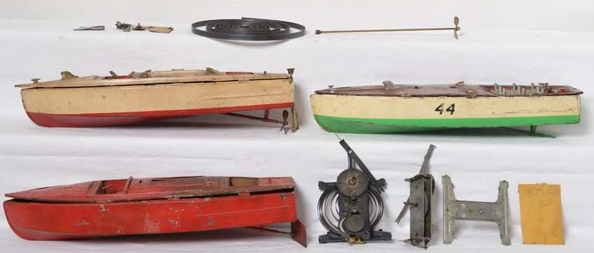 Three Lionel boats, two 43 runabout and one 44 speedste: Prewar Lionel tinplate mechanical pond boats, two 43 runabouts and one 44 speedster. All are restoration/parts boats that are sold incomplete as is shown in our photos with no returns.