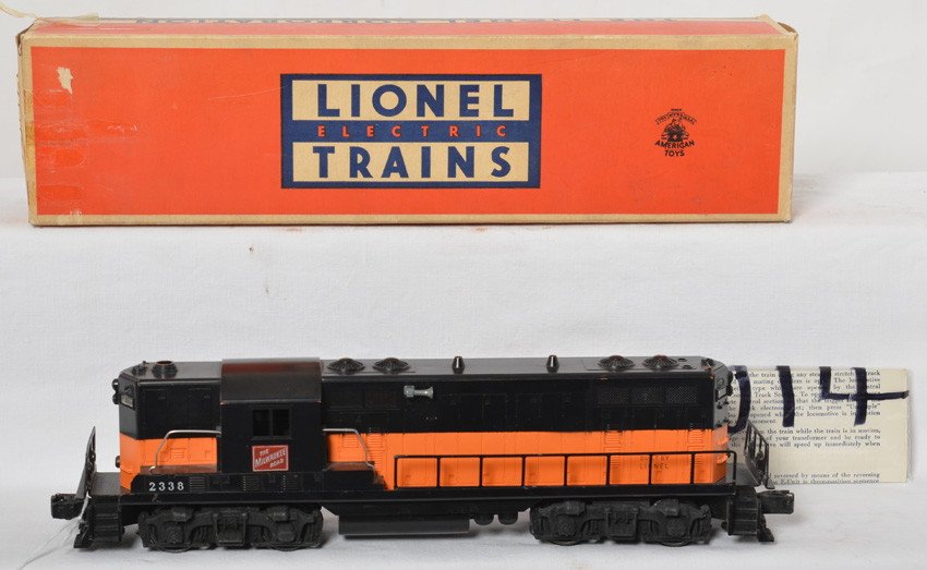 Lionel 2338 The Milwaukee Road GP-7 diesel in OB: Postwar Lionel O gauge 2338 The Milwaukee Road GP-7 road switching diesel locomotive in original box with sheet of wrapping paper and instructions sheet. Train looks C7. Box has an end taped shut with