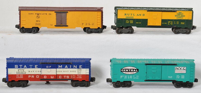 Lionel 3494-275, 6464-900, 3672, 6464-300 freight cars: Postwar Lionel O gauge 3494-275 BAR State of Maine operating boxcar, 6464-900 New York Central boxcar, 3672 Corn Products Bosco reefer, and 6464-300 Rutland boxcar, 3672 is missing a decal, otherwise