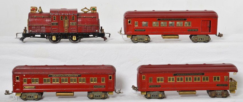 American Flyer O gauge Ambassador passenger train: Prewar American Flyer O gauge Ambassador red passenger train with 3187 center cab electric loco, 3380 Club Car, 3381 Pullman, and 3382 observation. 3380 and 3382 have repainted roofs, 3380 has missing