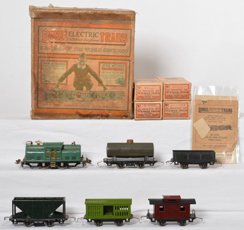 Lionel Outfit No. 294 electric freight set in OB: Prewar Lionel O gauge Outfit No. 294 electric freight set in original boxes with 252 center cab electric locomotive with 801 caboose, 802 cattle, 803 coal, 804 oil, and a 901 gondola?. Trains look nic