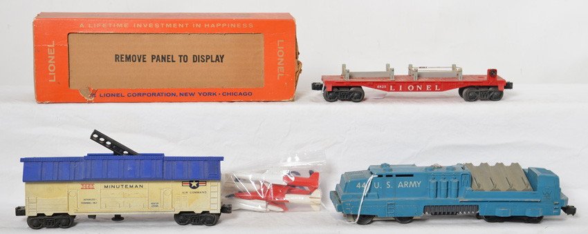 Lionel 44, 3665, 6825, nice No. 44 OB with sleeve: Postwar Lionel O gauge 44 U.S. Army missile launcher in original box with sleeve and display panel intact. 3665 Minuteman rocket launcher and 6815 flatcar with rockets. 44 is missing two front steps, 