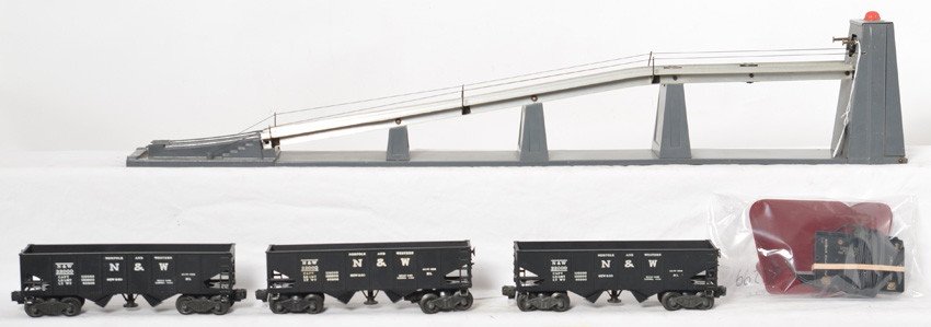 Lionel 456 coal ramp, cars and accessories: Lionel Postwar O gauge coal accessories. Include 456 coal ramp with controller. Some light small spots of rust on the main tower support and the base, three 3456 Norfolk and Western operating hoppers 