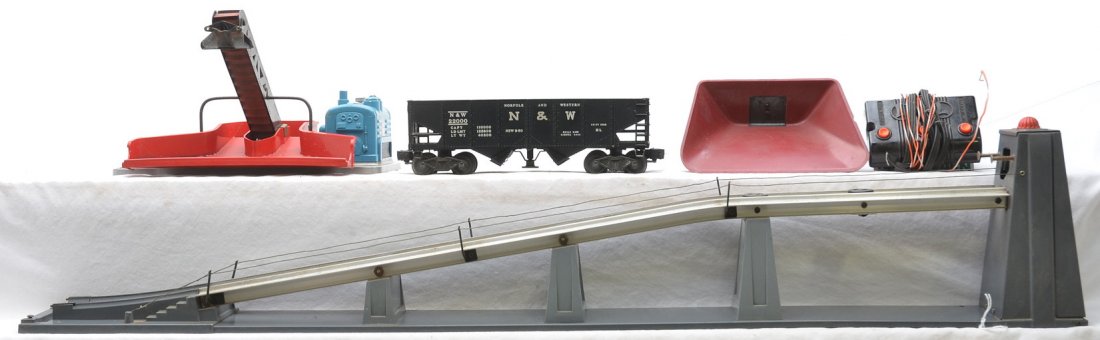 Lionel 397 Coal Loader 456 Coal Ramp w/3456: Lionel postwar 397 operating coal loader with a blue generator and a 456 coal ramp with controller and 3456 black Norfolk and Western hopper. The 397 has a broken shield. The 397 and 456 are C5.
