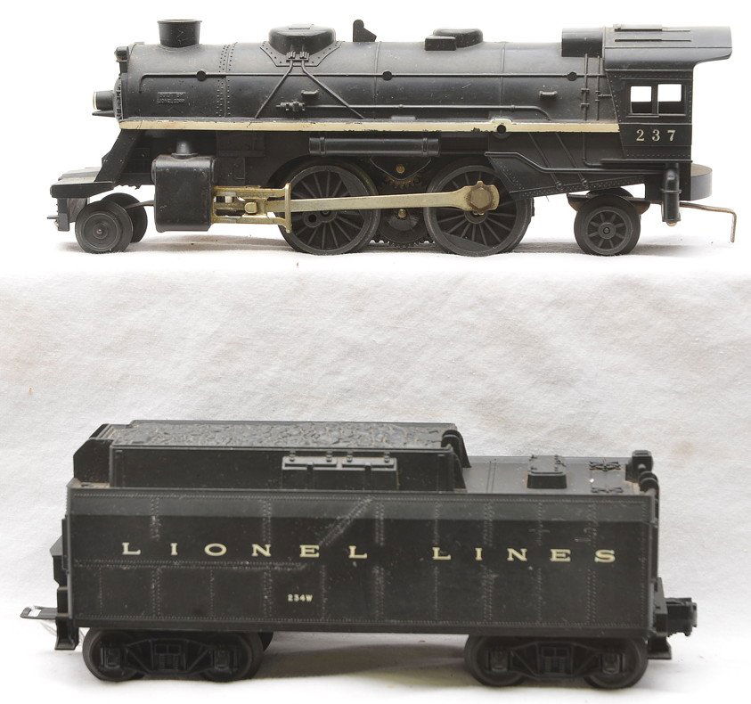 Lionel 237 Steam Loco with 234W Tender: Lionel postwar 237 black 2-4-2 steam loco with a 234W tender. The loco has a crack in the shell in front of the cab. The tender is C7.