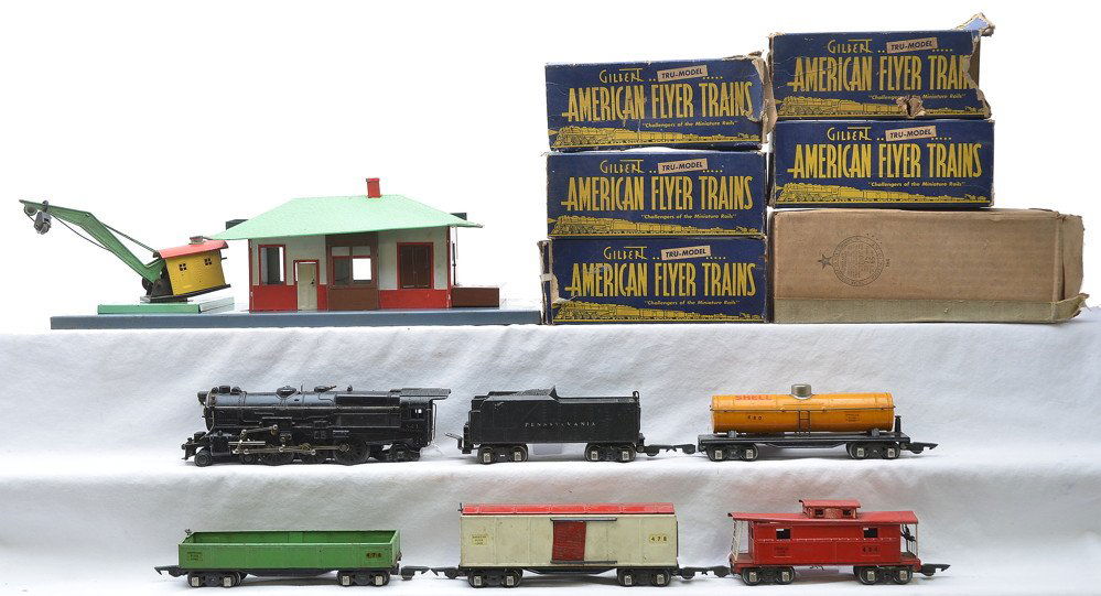 AF Freight Set 561 558 476 478 480 484 612: American Flyer prewar O gauge freight set including; 561 black 4-6-2 steam loco, 558 tender. 476 green gondola, 478 white boxcar with red roof, 480 orange Shell tank and a 484 red caboose all in worn