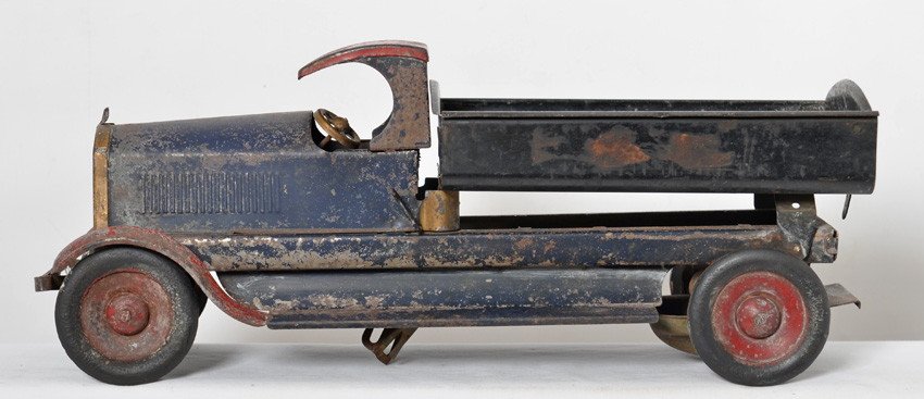 Turner Toys and Buddy L pressed steel trucks: Prewar Turner Toys pressed steel pickup truck and Buddy L Express pressed steel delivery truck. Trucks look C5-6 in original paint.