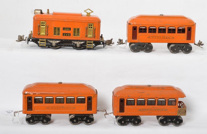 Lionel 248 boxcab, two 603 Pullman, 604 observation: Prewar Lionel O gauge 248 boxcab electric locomotive with two 603 Pullman coaches and a 604 observation, all in orange. Trains look C6 area.