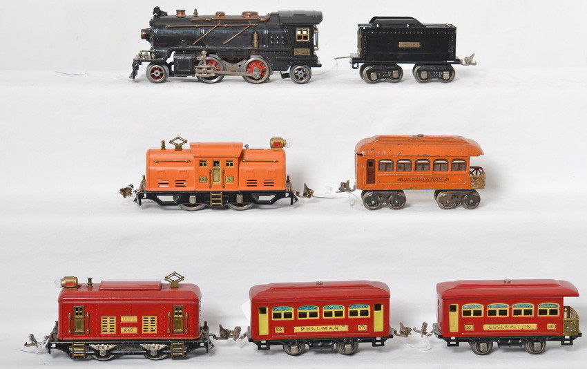 Lionel 261, 252, 604, 248, 629, 639 prewar O gauge: Prewar Lionel O gauge 261 steam locomotive and unnumbered tender, 252 center cab electric locomotive, 604 observation, 248 boxcab electric locomotive, 629 Pullman, and 630 observation. 604 looks C6 or