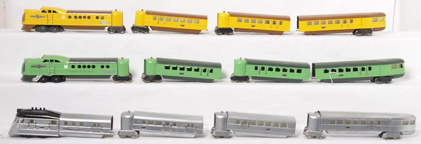 Lionel 616, 617, 617, 618, 636W x2, 637 x4, 638 x2: Prewar Lionel O gauge articulated diesel passenger trains that have been restored to look C7. Flying Yankee 616 powered unit, two 617 coaches, 618 observation, two 636W City of Denver powered units, f