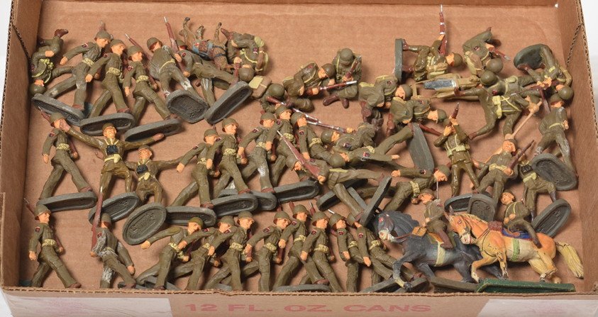 Huge lot of Elastolin WWII American soldiers/troops: Huge lot of forty-five Elastolin WWII American soldiers/troops. some are marching, some are sitting, one is firing a machine gun, two are mounted on horse back, some are officers, one dog, and others.