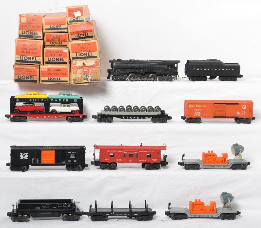 Lionel 681, 2671W, 6464-425, 3620, 6262, 3461, 3469....: Postwar Lionel O gauge 681 steam locomotive, 2671W Pennsylvania whistle tender, 6464-25 Great Northern boxcar, 6464-425 New Haven boxcar, two 3620 rotating searchlight cars, 6262 wheel car, 3469 autom