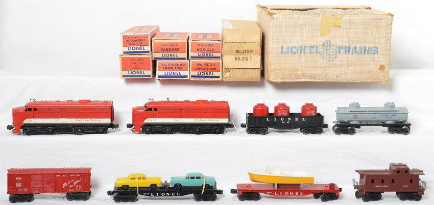Lionel 1599 MKT freight set in OB: Postwar Lionel O gauge 1599 MKT The Texas Special twin Alco diesel freight set with 210P and 210T MKT The Texas Special twin Alco diesel A units, 6801 flatcar with boat, 6112-1 canister car w/three re