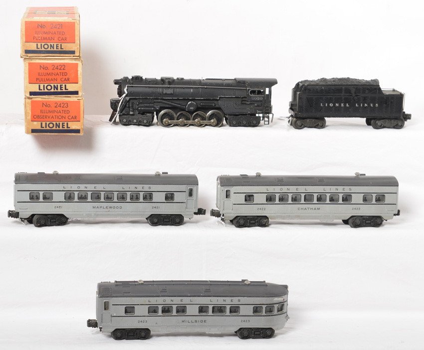 Lionel 2020, 2020W, 2421, 2422, 2423 passenger train: Postwar Lionel O gauge 2020 steam locomotive, 2020W whistle tender, 2421 Maplewood Pullman, 2422 Chatham Pullman, and 2423 Hillside observation, trains look nicer C6. Boxes have a few missing inner fl