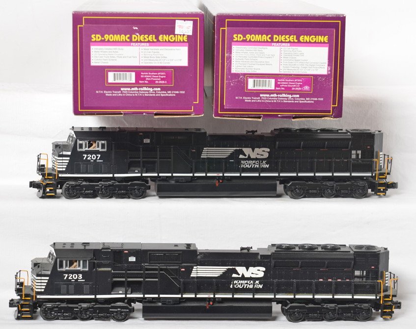 MTH Norfolk Southern SD90MAC power and dummy: MTH modern O gauge Norfolk Southern SD90MAC pair in OBs. Catalog numbers are 20-2628-1 and 20-2628-3. Powered loco features Protosound 2.0, DCS control, Protosmoke, Protocouplers, and more. Locos are 